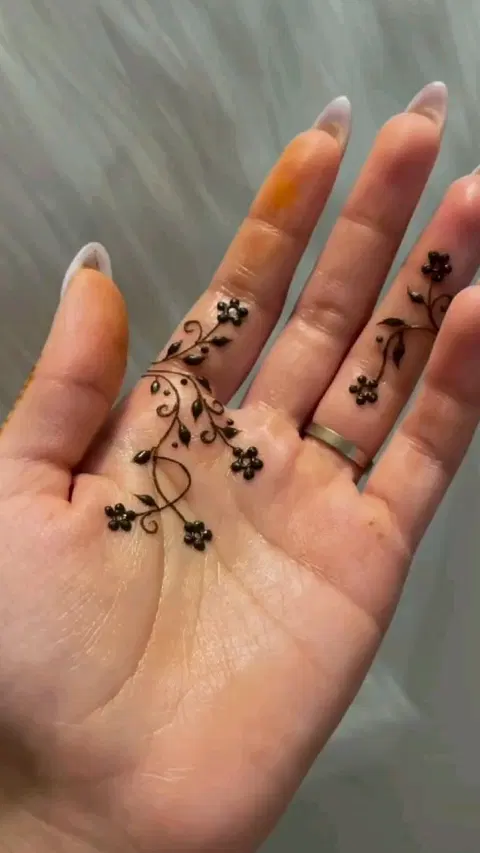 arabic minimal flower finger mehndi design