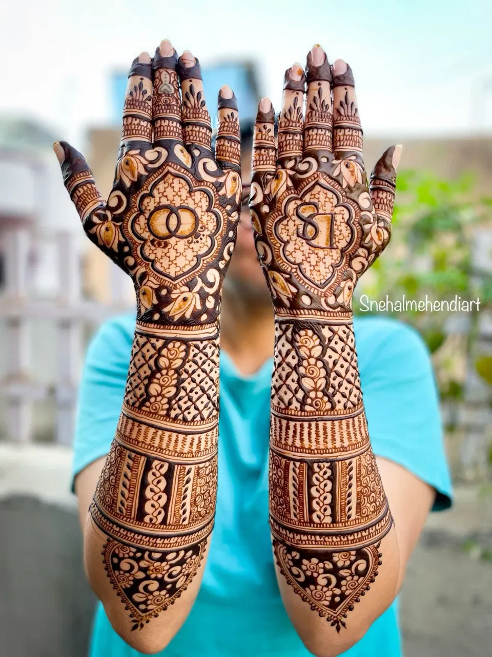 Bridal Back Hand Mehndi Design with Figures and Hearts for Engagement