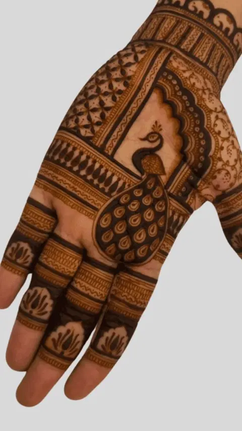 aesthetic indian peacock front hand mehndi design