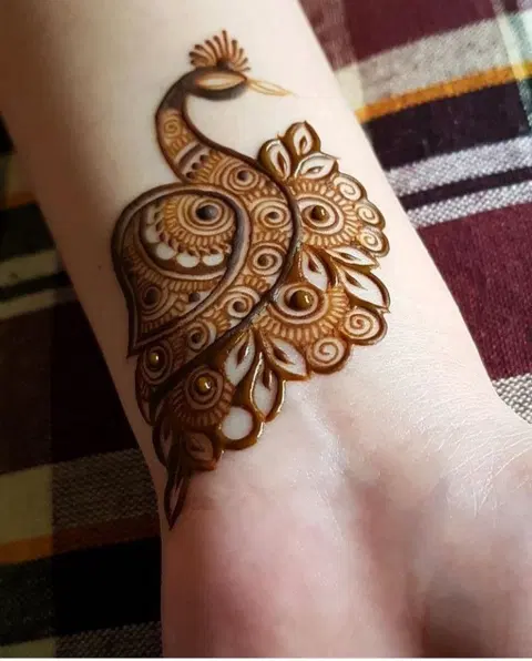 stylish deity arm mehndi design