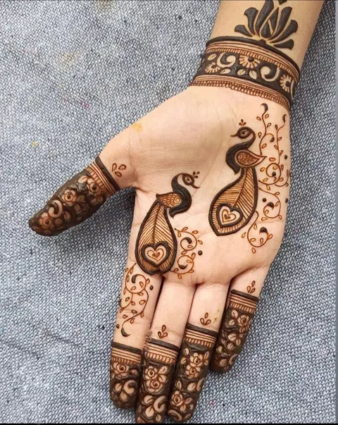 simple stylish butterfly front hand mehndi design