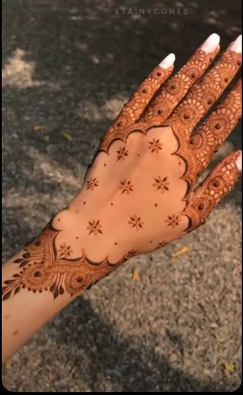 aesthetic dubai lotus back hand mehndi design