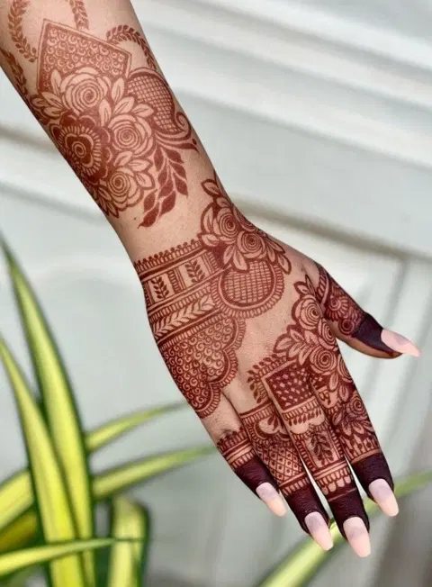 aesthetic royal flower back hand mehndi design