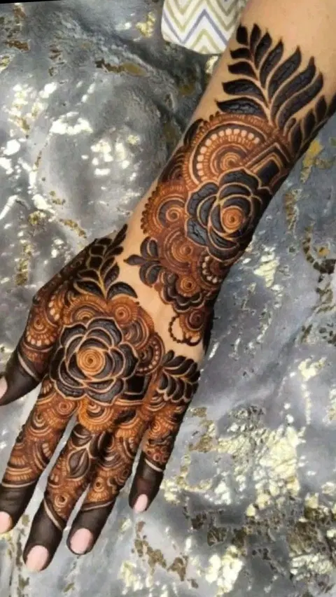 aesthetic royal flower back hand mehndi design