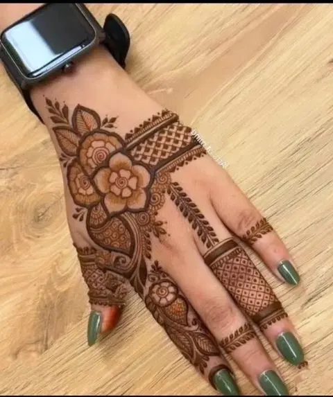 aesthetic bridal bel back hand mehndi design