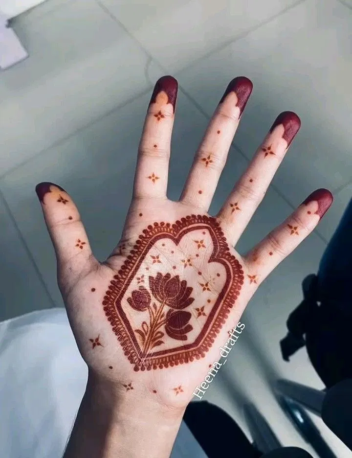 Aesthetic Indian Back Hand Mehndi Design with Flowers and Hearts
