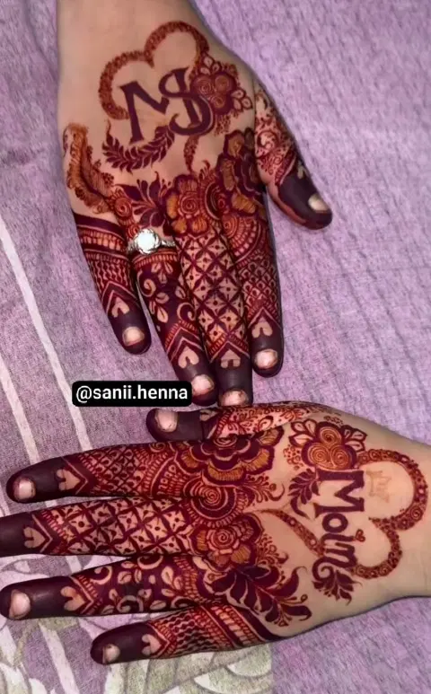 bridal stylish figure front hand mehndi design