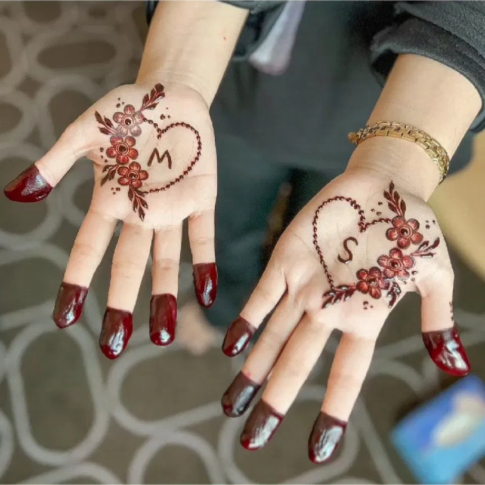 Simple Front Hand Mehndi Design with Figures, Hearts and Jaal