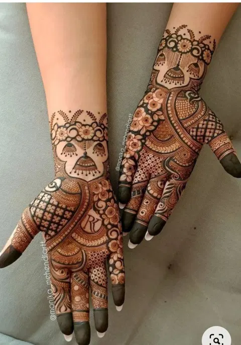 bridal stylish deity front hand mehndi design