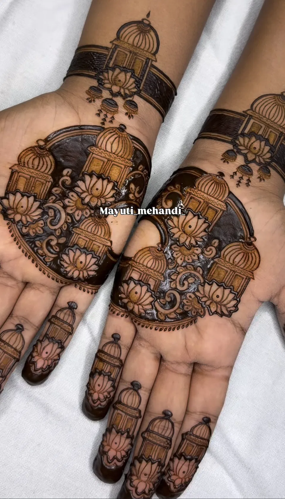 Bridal Back Hand Mehndi Design with Bel and Gol Tikki