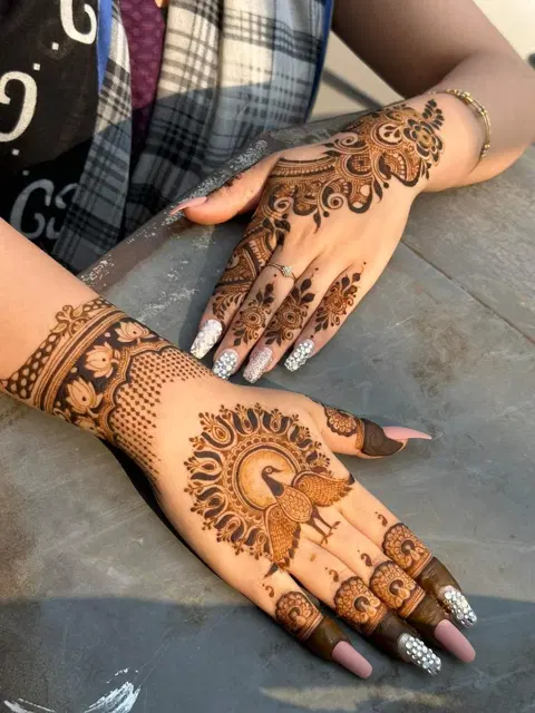 royal peacock back hand mehndi design