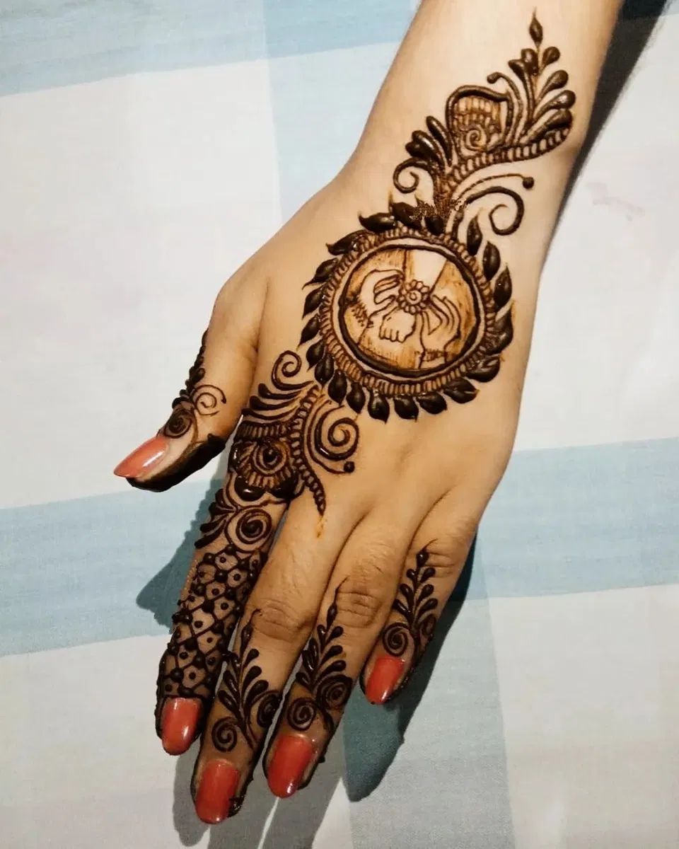 Arabic Back Hand Mehndi Design with Gol Tikki and Jaal
