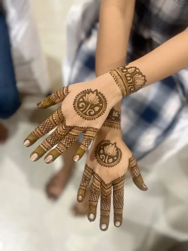 Back Hand Mehndi Design with Deity and Lotus