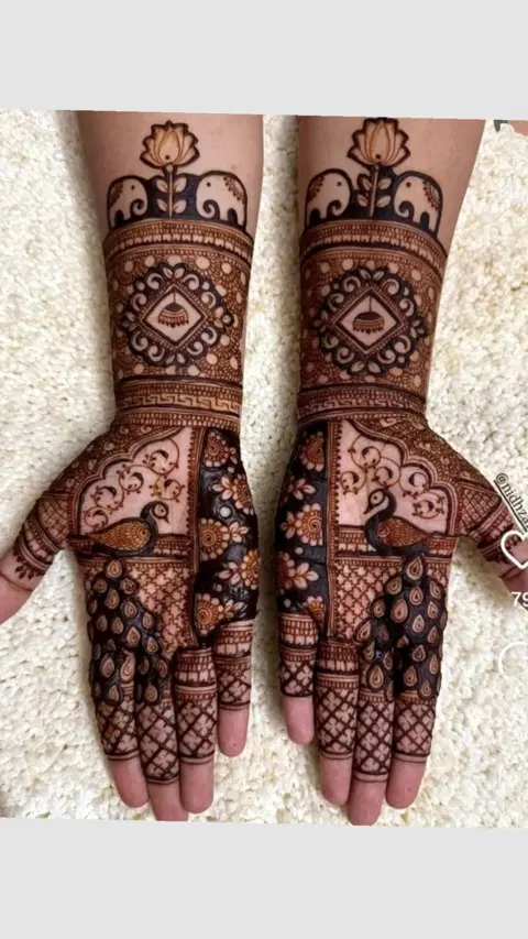 aesthetic bridal figure front hand mehndi design