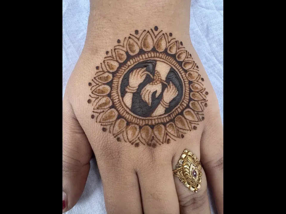 Bridal Stylish Back Hand Mehndi Design with Gol Tikki and Peacock