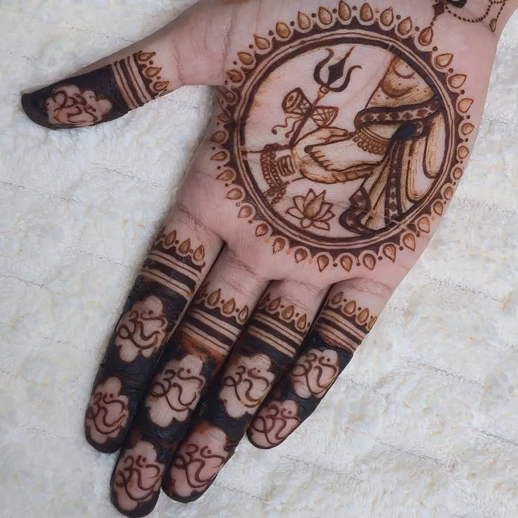 Bridal Stylish Back Hand Mehndi Design with Gol Tikki, Deity and Figures for Shivratri (2)