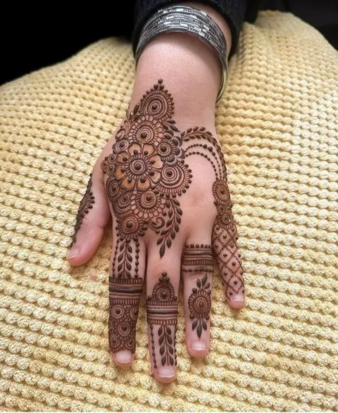 aesthetic simple lotus back hand mehndi design