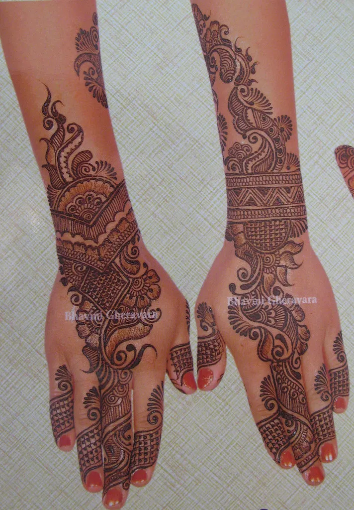 Arabic Back Hand Mehndi Design with Peacock