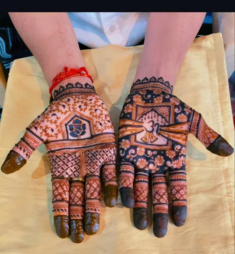 bridal deity front hand mehndi design