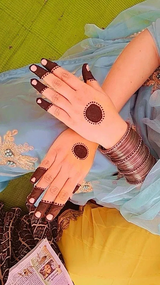 Simple Arm Mehndi Design with Gol Tikki and Jaal