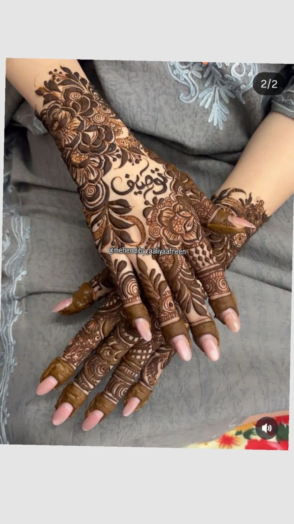 Dubai Stylish Back Hand Mehndi Design with Flowers and Hidden Name