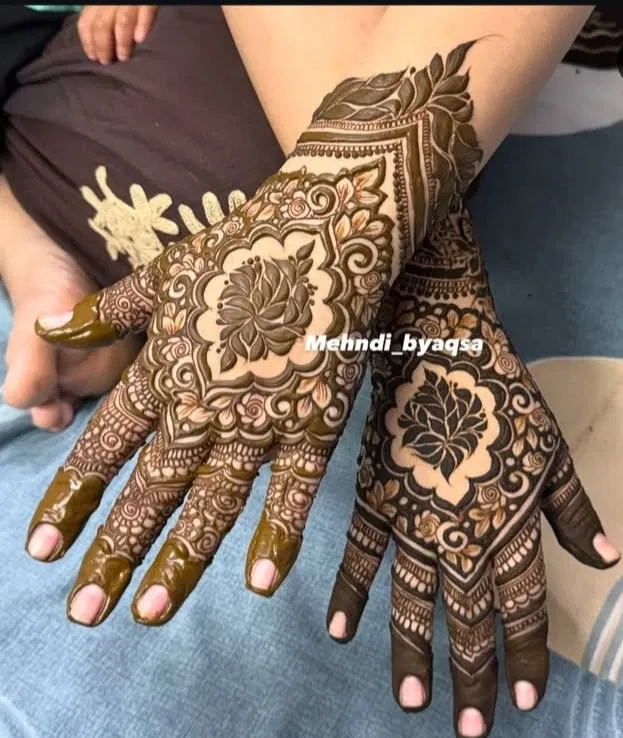 Aesthetic Bridal Back Hand Mehndi Design with Gol Tikki and Deity