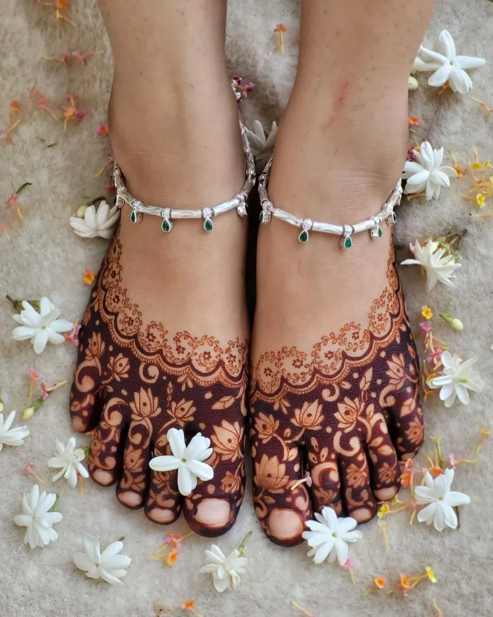Aesthetic Minimal Back Hand Mehndi Design with Gol Tikki, Figures and Flowers