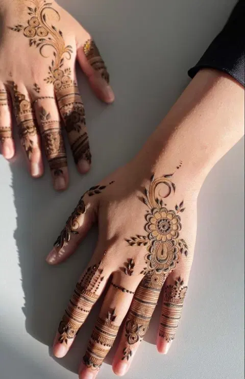 aesthetic minimal jaal back hand mehndi design