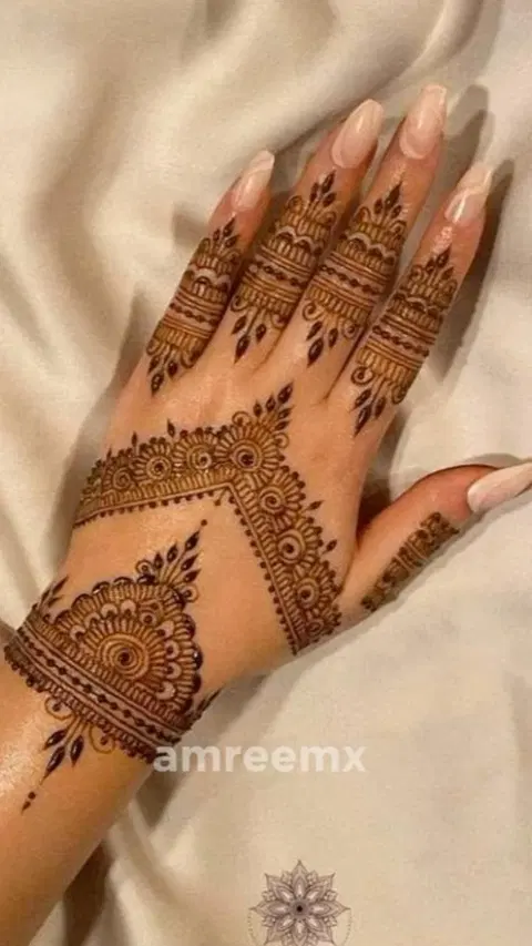 aesthetic bridal deity arm mehndi design