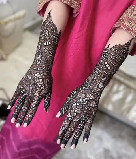 bridal deity arm mehndi design
