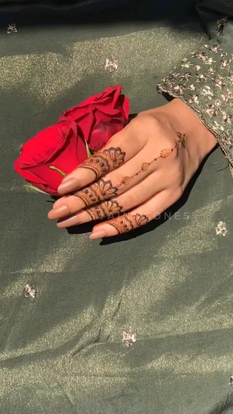 aesthetic simple flower back hand mehndi design