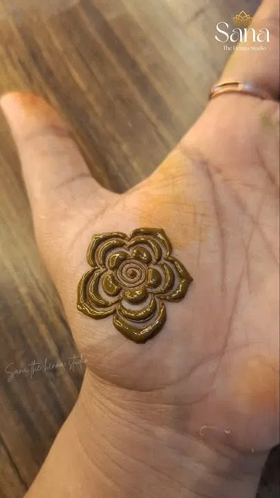 Dubai Back Hand Mehndi Design with Gol Tikki and Flowers