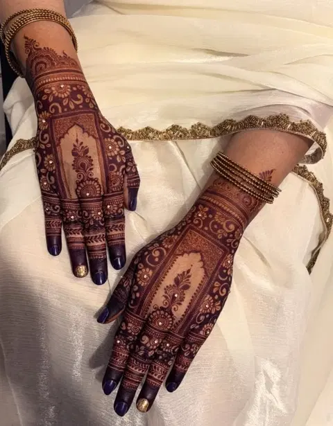 bridal royal figure back hand mehndi design