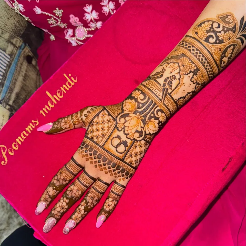 Bridal Back Hand Mehndi Design with Hidden Name for Engagement (2)