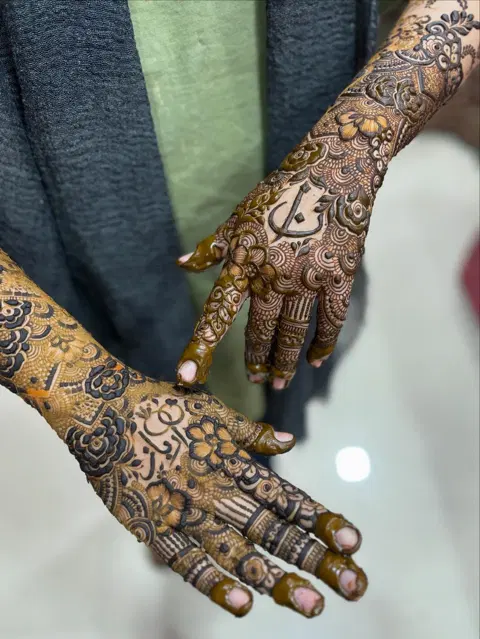 bridal pakistani figure back hand mehndi design