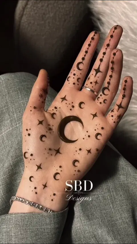 aesthetic simple moon back hand mehndi design