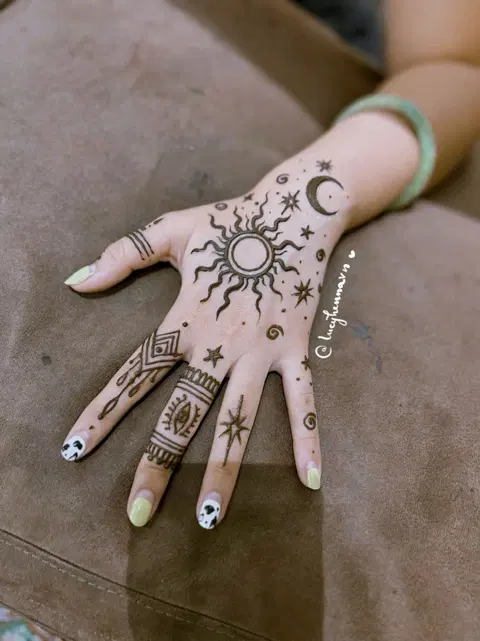 aesthetic simple moon arm mehndi design
