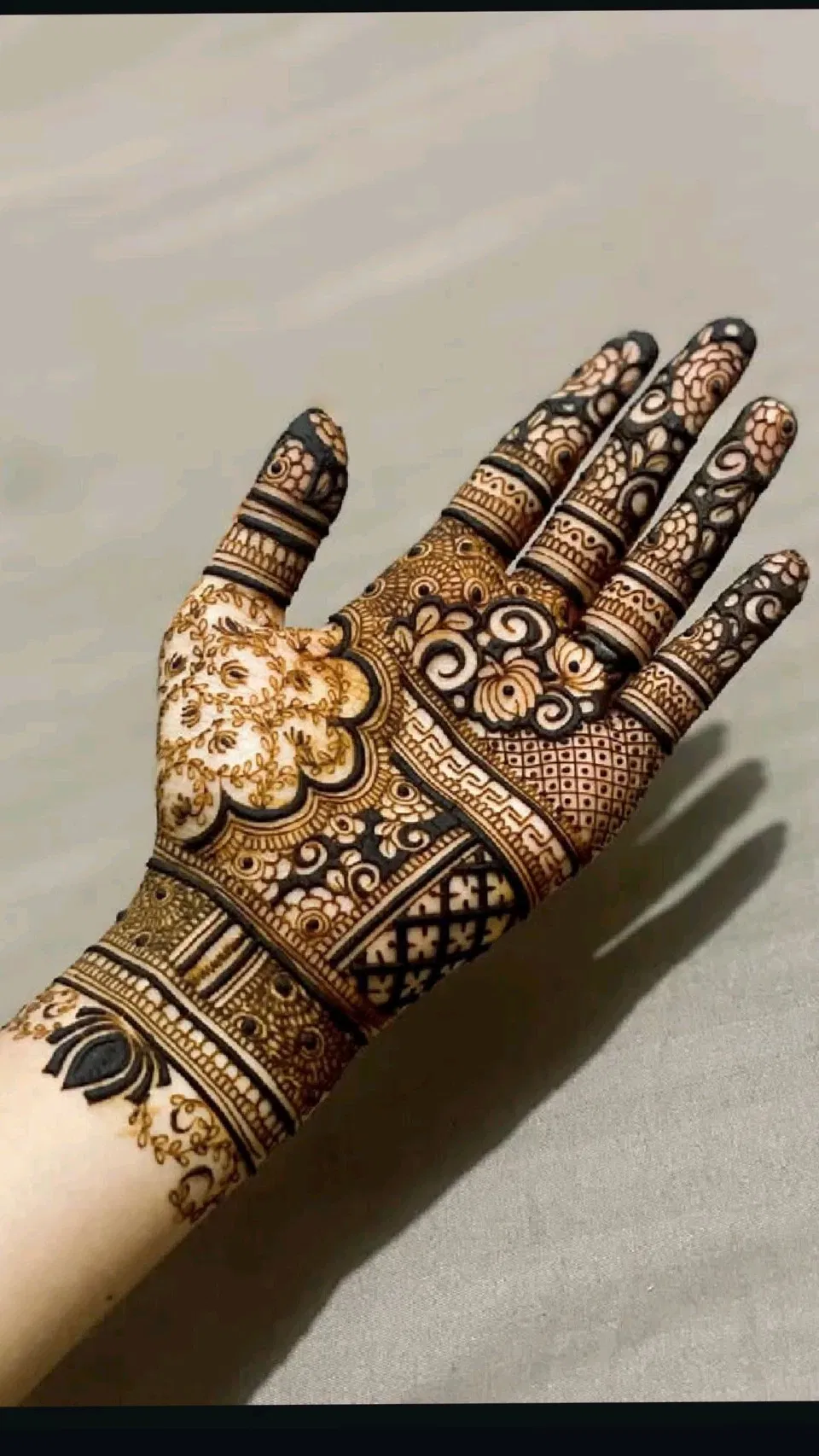 Aesthetic Bridal Back Hand Mehndi Design with Gol Tikki, Lotus and Peacock for Diwali