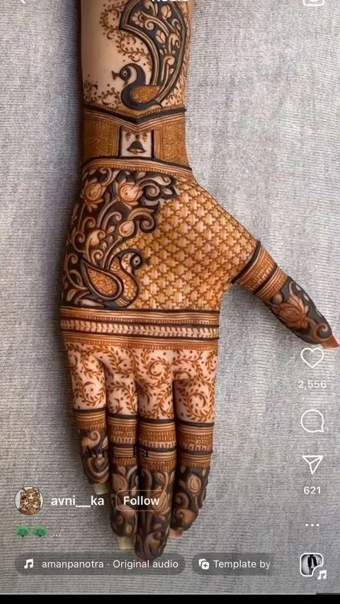 bridal indian figure back hand mehndi design