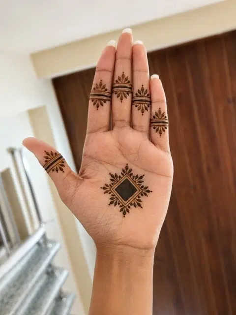 aesthetic minimal bel finger mehndi design