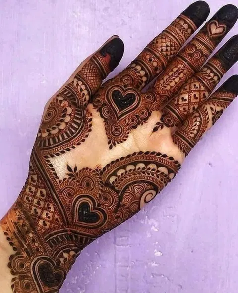 aesthetic arabic heart finger mehndi design