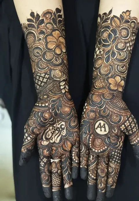 arabic bridal figure front hand mehndi design