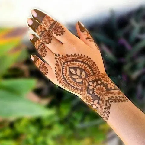 minimal royal lotus back hand mehndi design