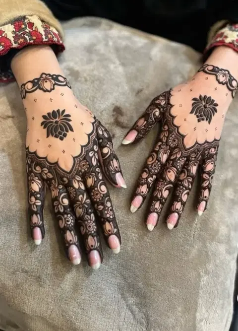 aesthetic arabic lotus back hand mehndi design