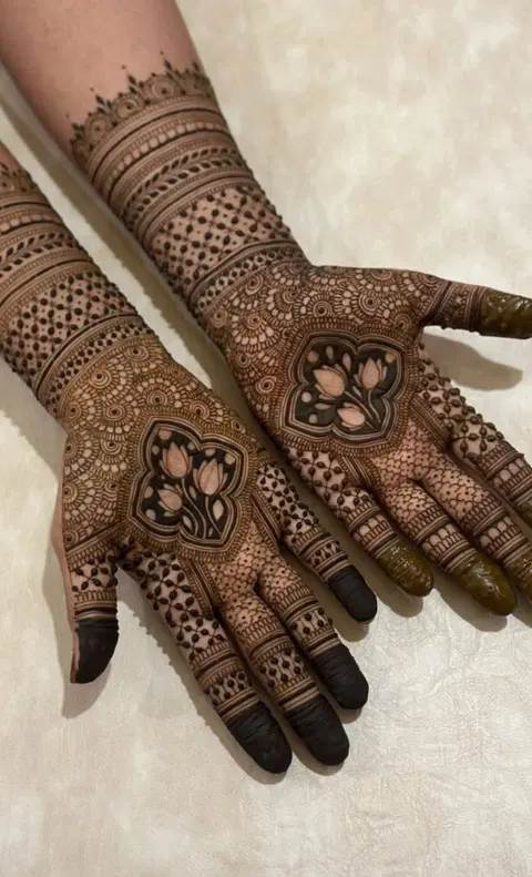 bridal royal heart back hand mehndi design