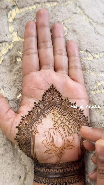 Aesthetic Bridal Back Hand Mehndi Design with Gol Tikki and Lotus (4)