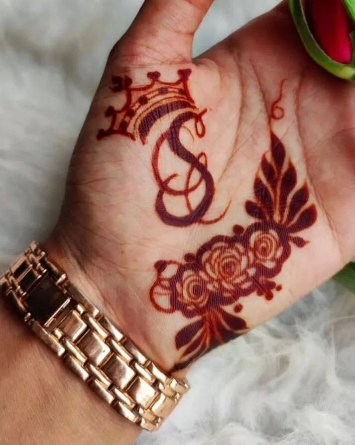 Arabic Stylish Back Hand Mehndi Design with Gol Tikki, Flowers and Jaal (3)