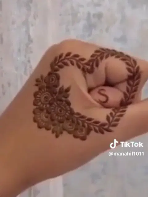 arabic simple circle arm mehndi design