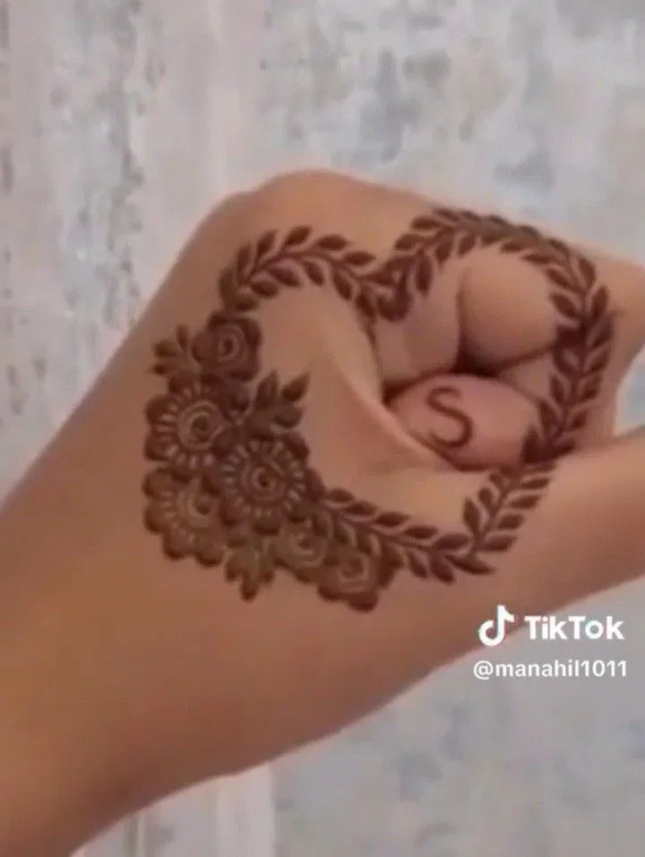 Arabic Simple Arm Mehndi Design with Gol Tikki and Hearts