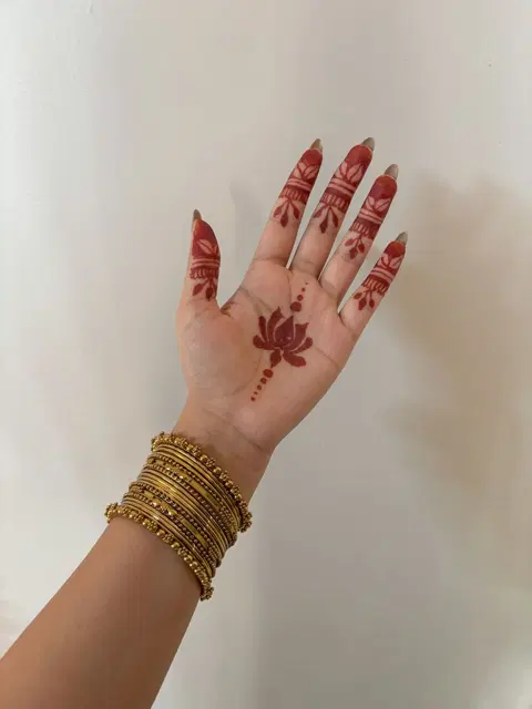 minimal simple lotus front hand mehndi design